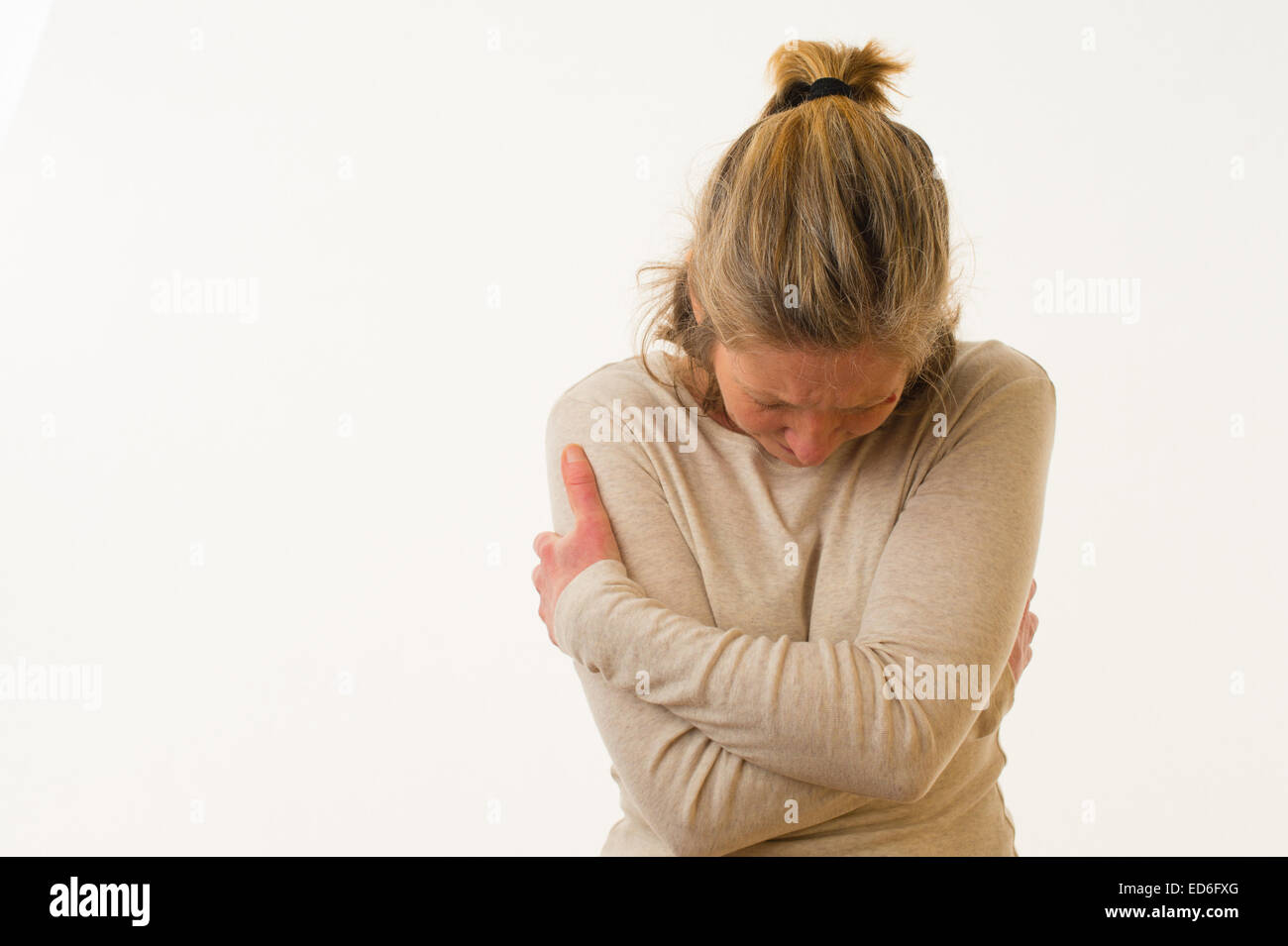 Single lonely mature woman hi-res stock photography and images - Alamy