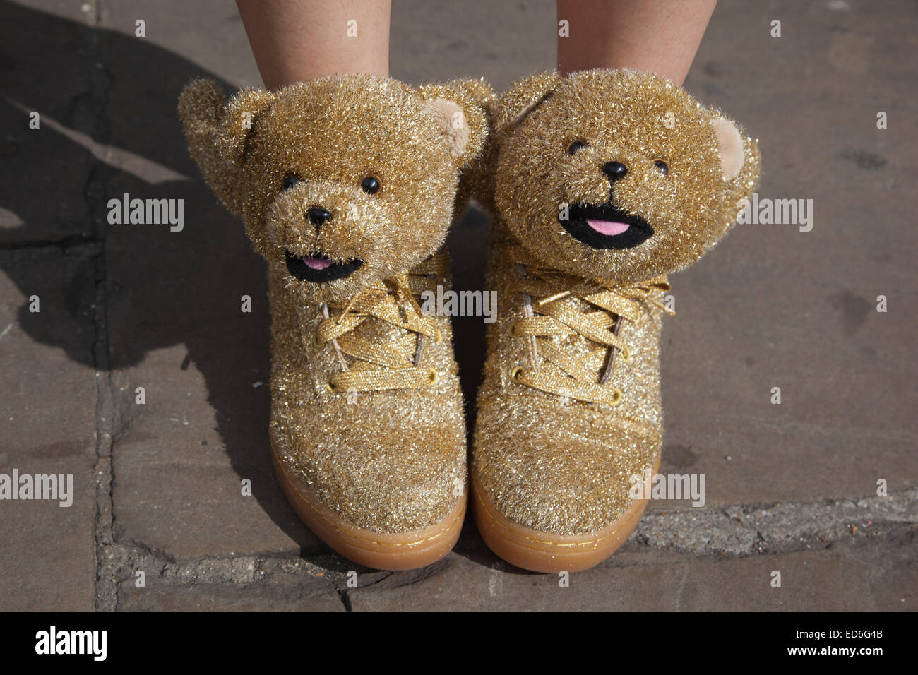 Golden Teddy bear shoes worn by a fashionista at London Fashion Week Stock  Photo - Alamy