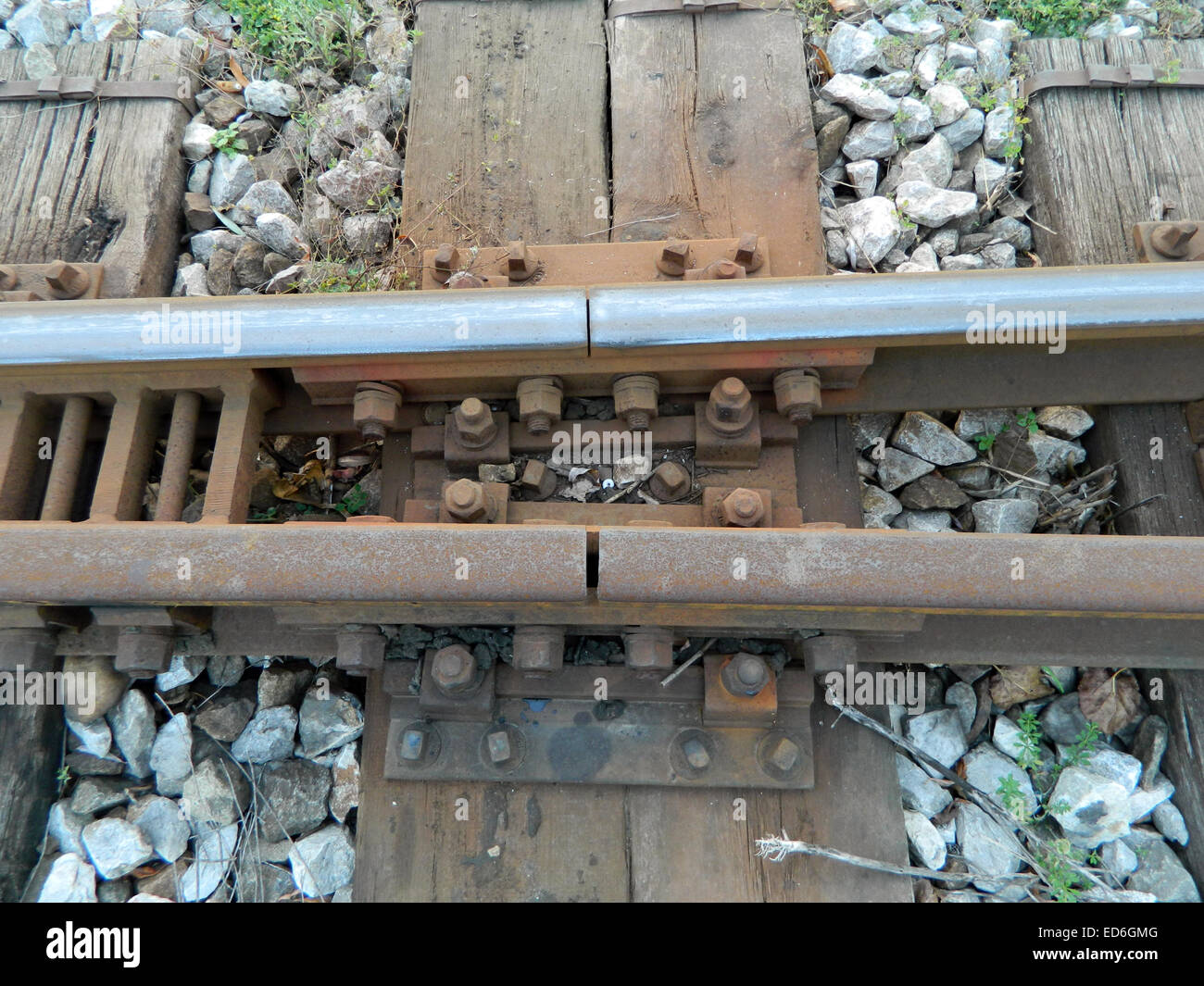 Jointed rails on a railway line. The way to connect two rails on the track Stock Photo Alamy