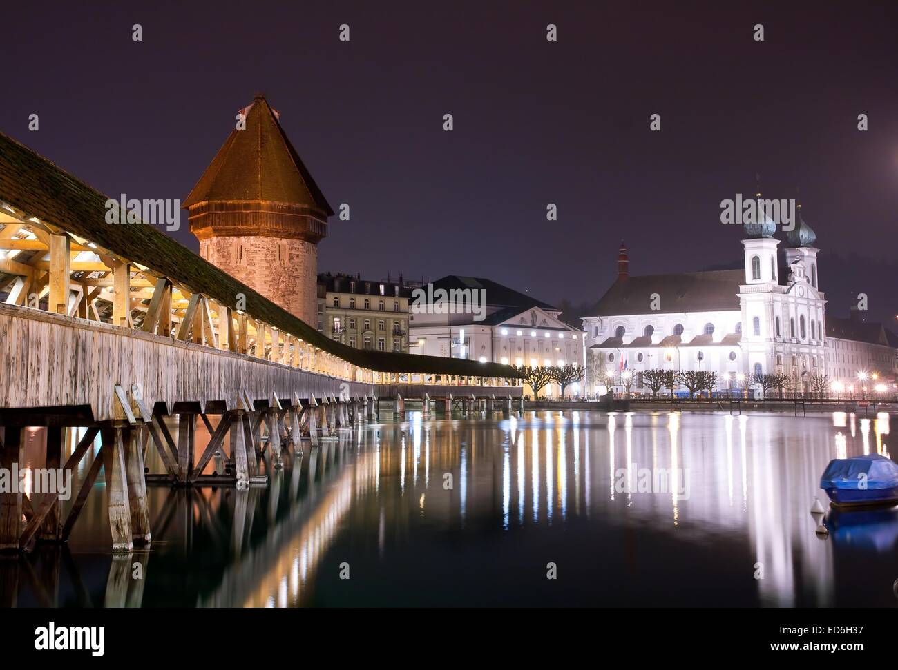 Famous wooden Chapel bridge foot walkway in Lucerne, Switzerland Stock Photo