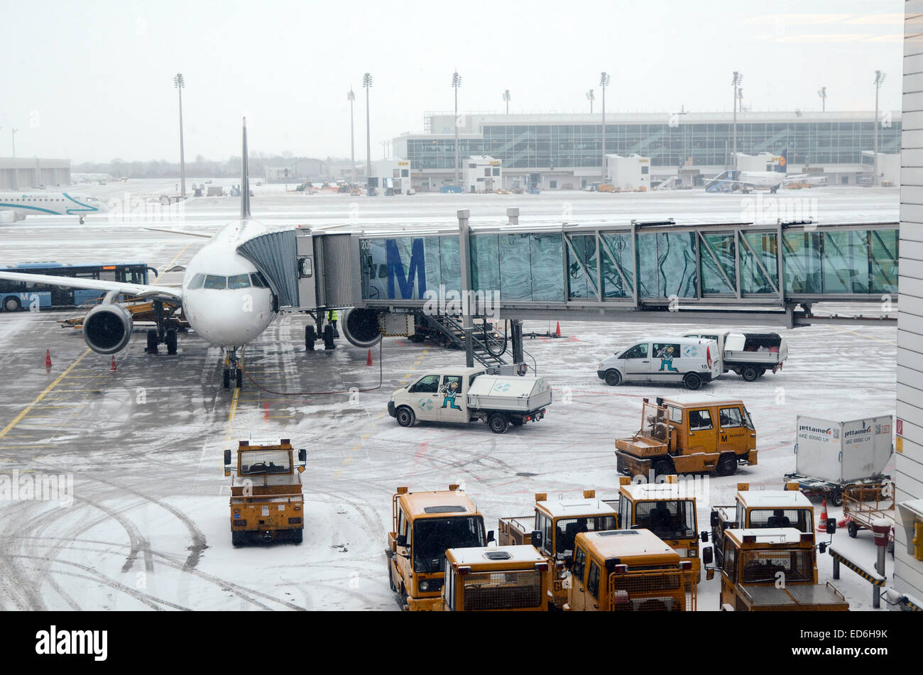 Munich, Germany. 29th December, 2014. Snow and freezing temperatures cause traffic chaos, delayed and cancelled flights in many European airports such as Munich Germany. Credit:  Chris Hellier/Alamy Live News Stock Photo