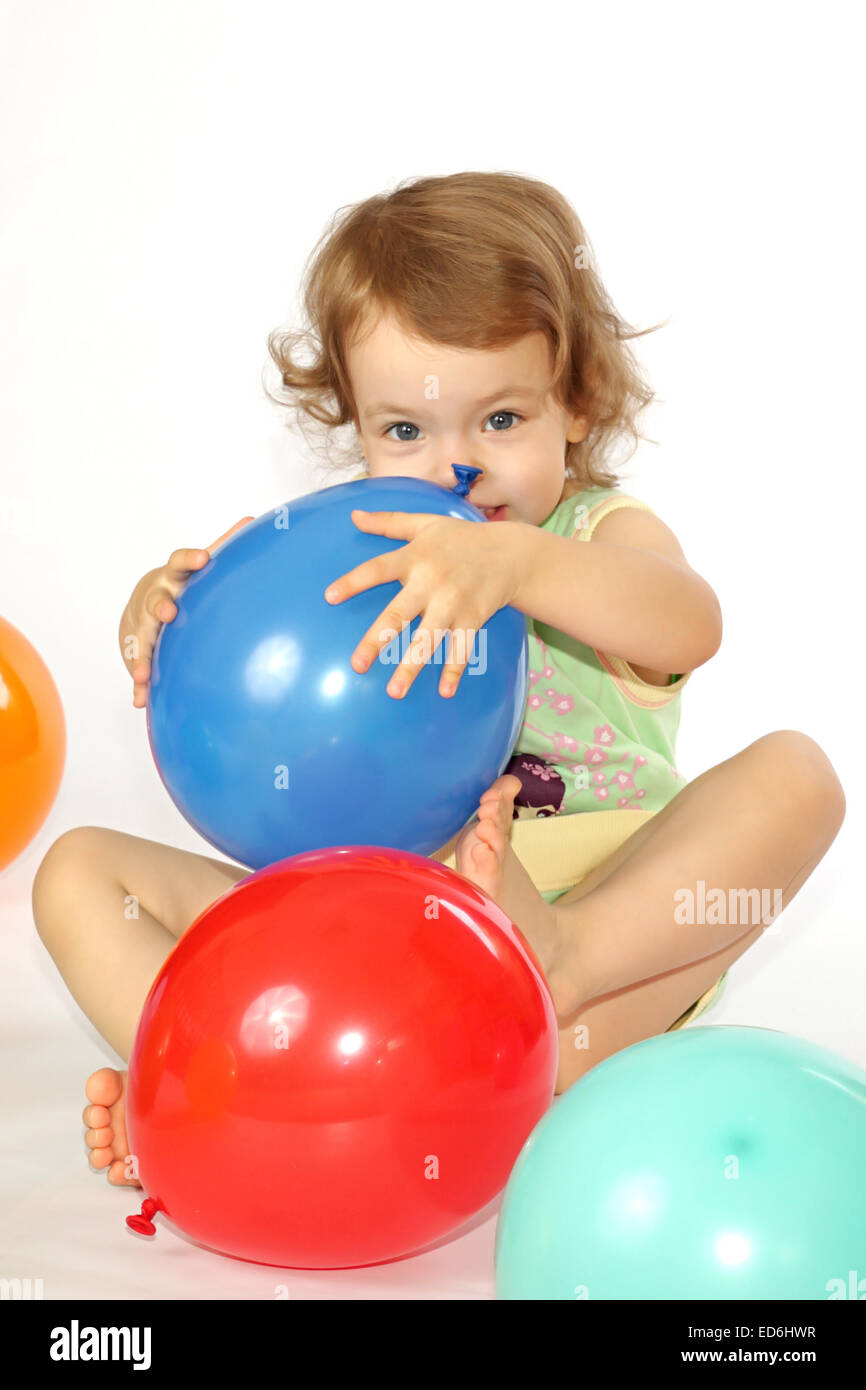 Little girl and balloons Stock Photo - Alamy