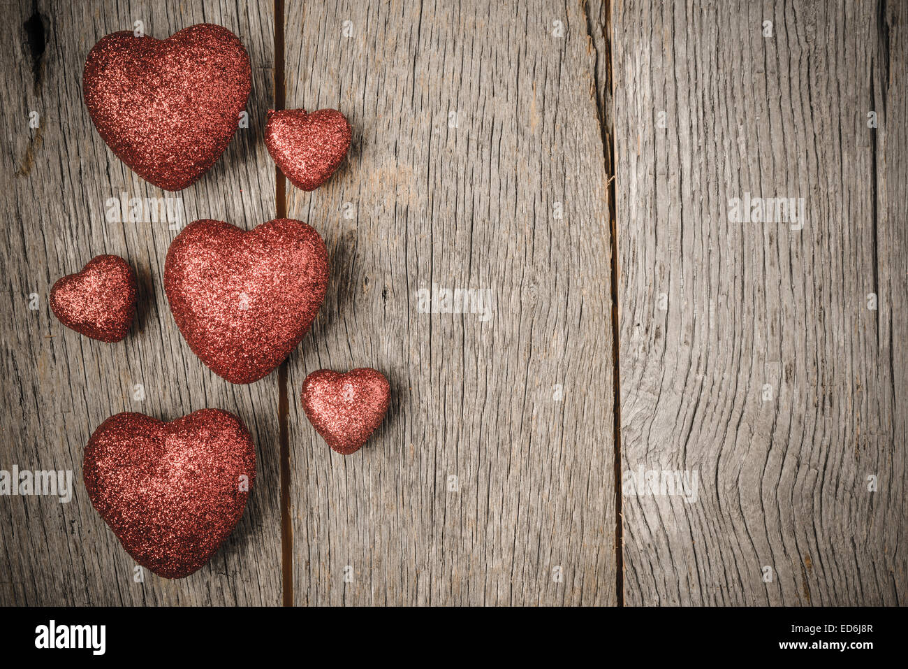 Hearts on Vintage Wood Background for Valentine's Day Stock Photo - Alamy