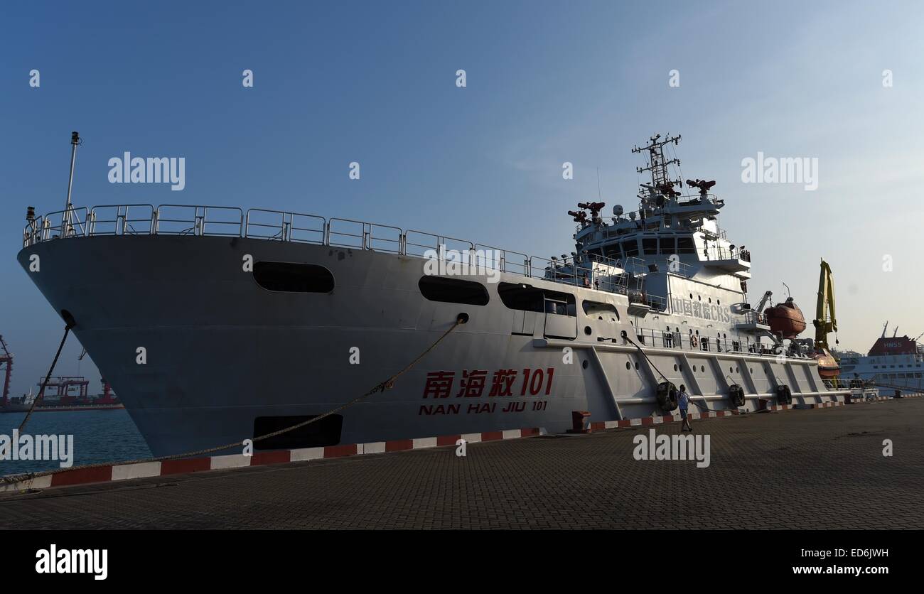 Haikou. 29th Dec, 2014. Photo taken on Dec. 30, 2014 shows Chinese rescue vessel Nanhaijiu 101 berthed in a port of Haikou, capital of south China's Hainan Province. China announced on Dec. 29, 2014 that it will send aircraft and vessel to join the search and rescue work for missing AirAsia flight QZ8501. By far, a navy frigate on routine patrol in the South China Sea is heading for the waters where the jet went missing. Besides, Chinese patrol ship Haixun 31, rescue vessel Nanhaijiu 101 and Nanhaijiu 115 are also standing by. © Zhao Yingquan/Xinhua/Alamy Live News Stock Photo