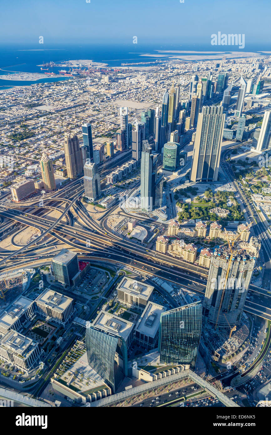 Vertical view of Dubai city from the top of a tower. Stock Photo
