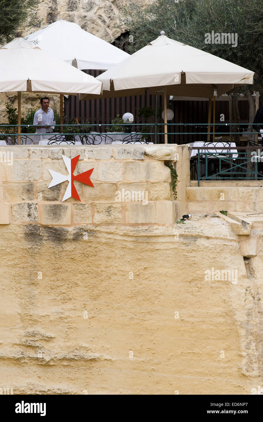 Maltese restaurant built in the side of a cliff hires stock photography and images Alamy
