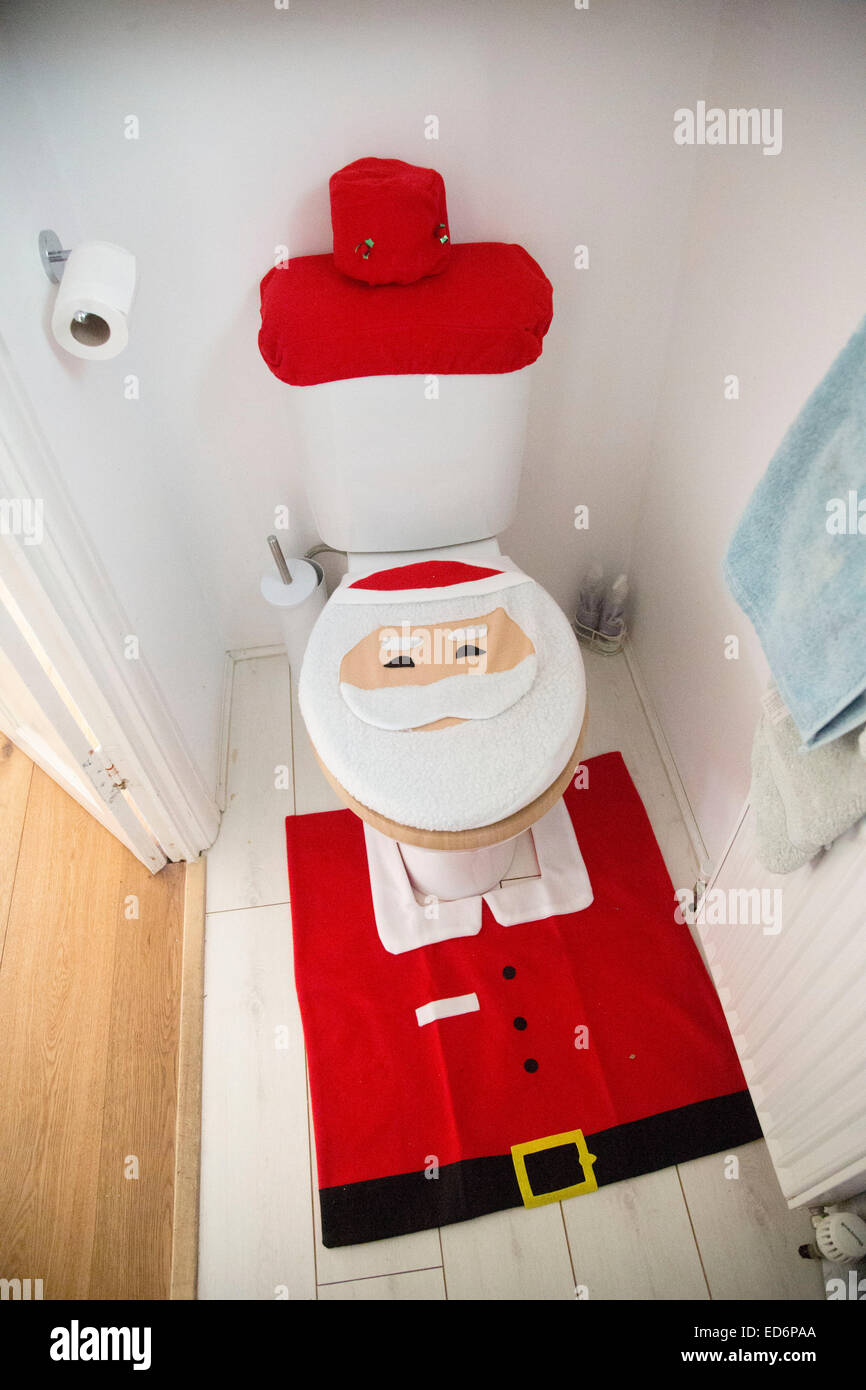 Santa Claus Father Christmas toilet novelty seat Stock Photo Alamy