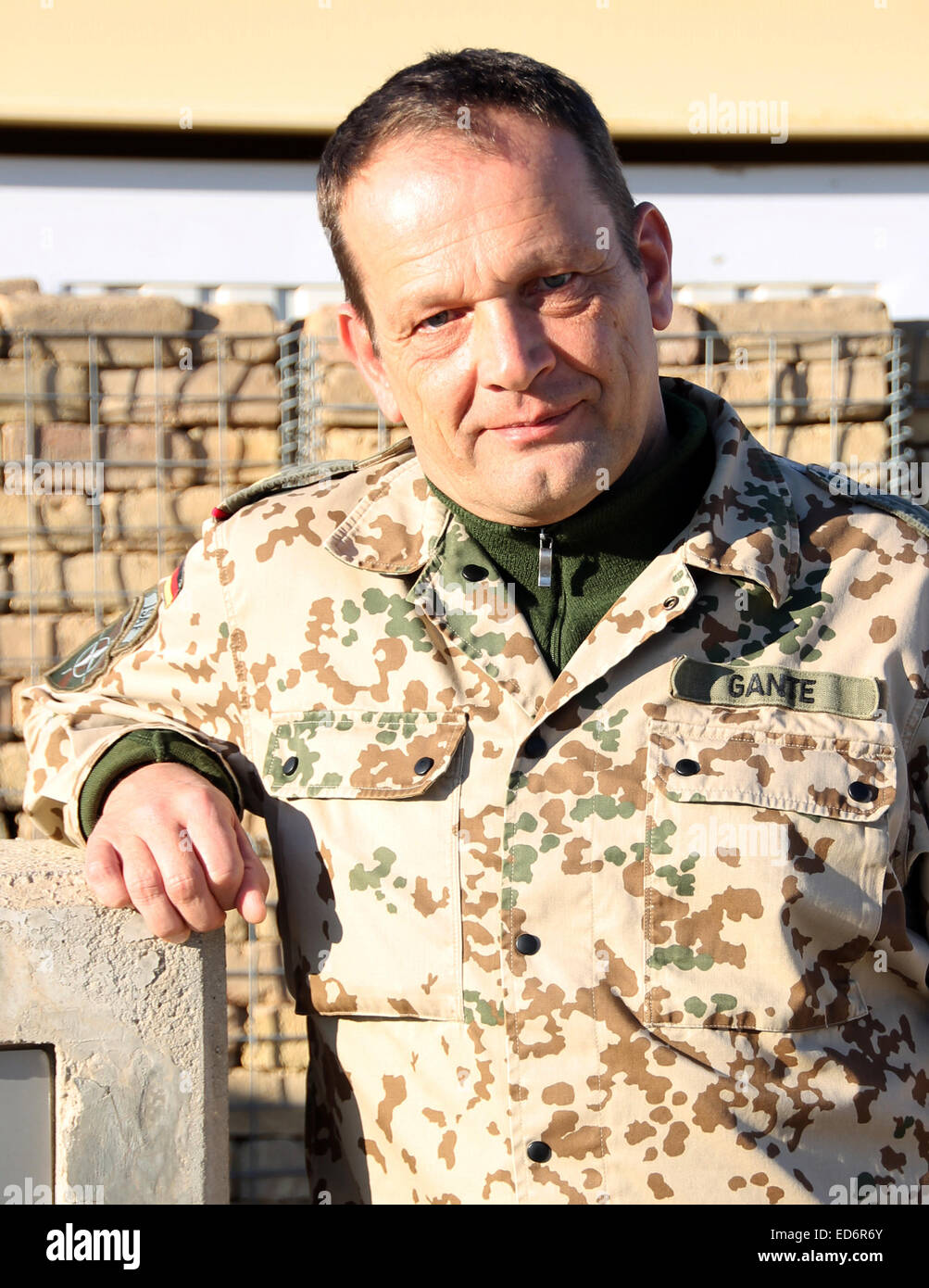 General Harald Gante, Commander of the German and international forces in Afghanistan, stands in the camp in Mazar-i-Sharif, Afghanistan, 10 December 2014. Photo: Can Merey/dpa Stock Photo