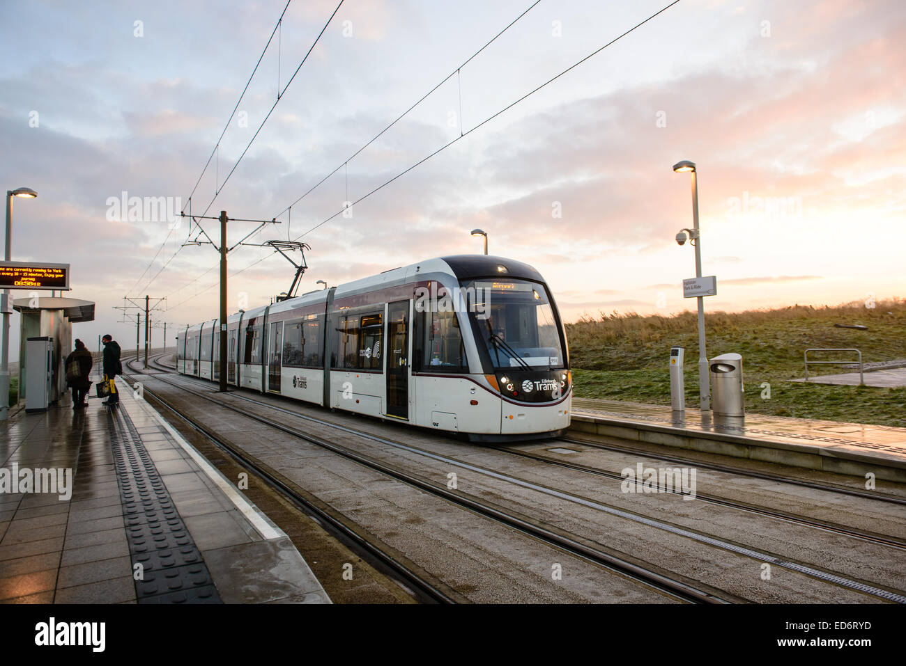 An early morning tram sits at the station at Ingliston Park & Ride, on it