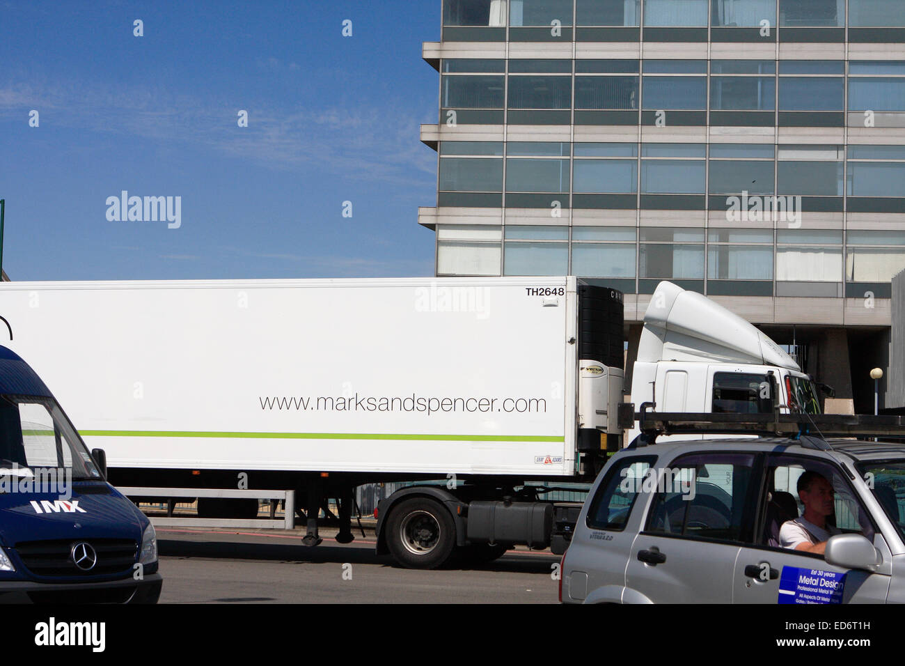 A M&S truck leaving a roundabout at Tolworth, Surrey, England. Stock Photo