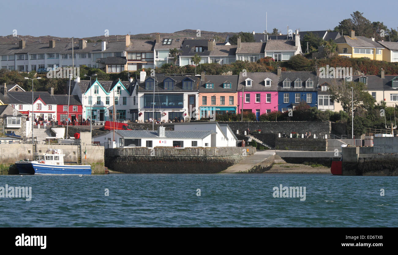 Irish seaside village viewed from sea, harbour and waterfront at