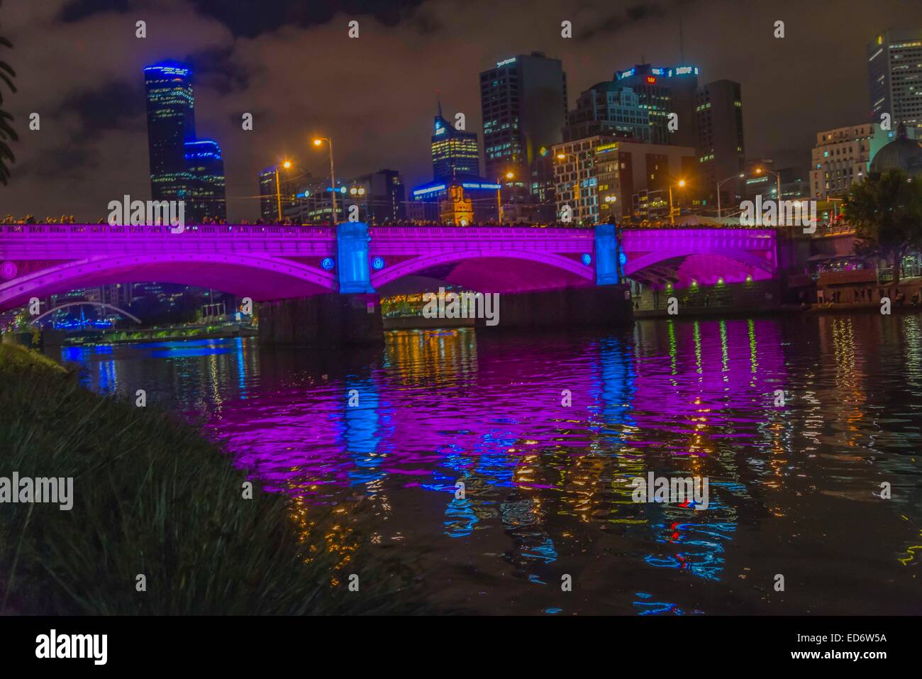 bridge melbourne colour lights on princess bridge over the yarra river during white night light show bridge lit up in purple, gr Stock Photo