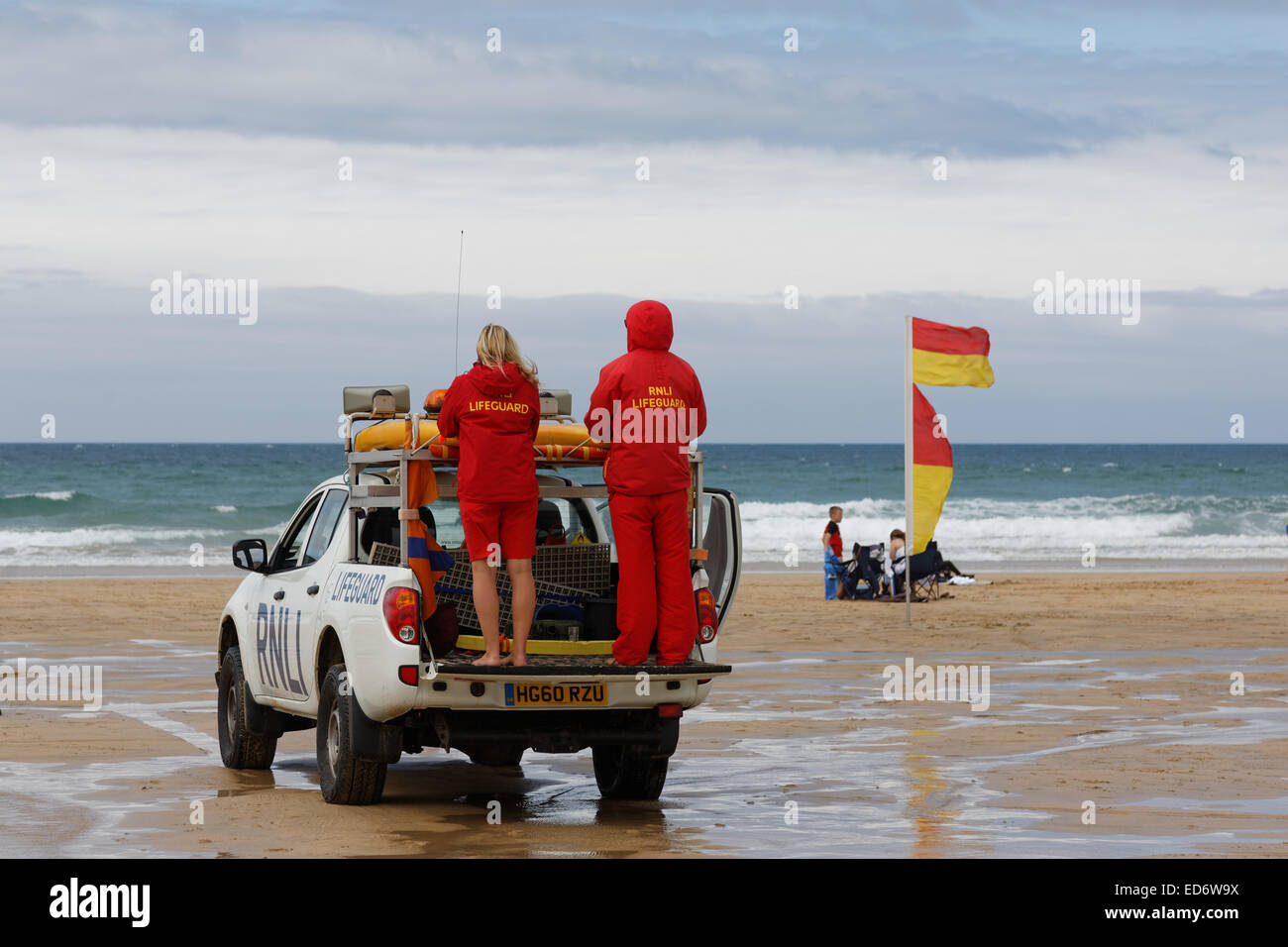 Life guards at fistral beach on a windy day in Newquay, Cornwall, UK. Stock Photo