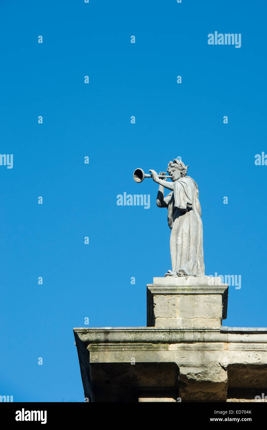 Statue of the muse of music, Euterpe. Roof of the Clarendon building, Oxford University, England Stock Photo