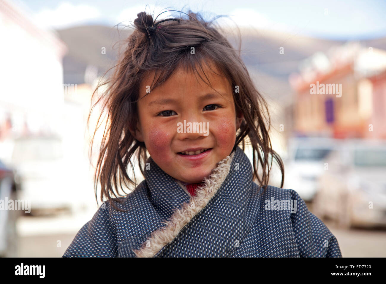 Close up portrait of Tibetan child in the village Qagca / Cacagoin, Sichuan Province, China Stock Photo