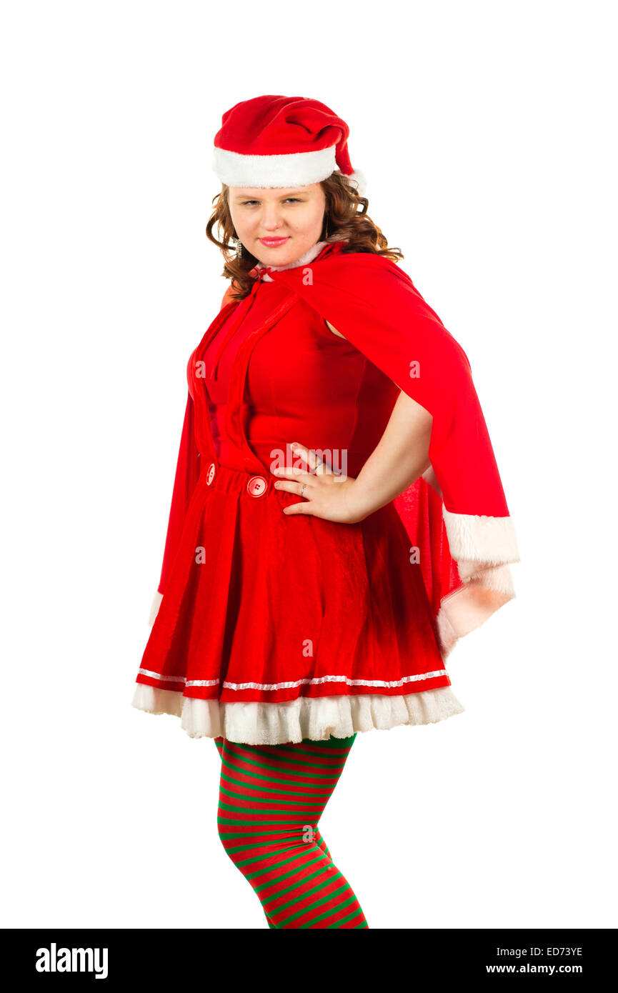 Mrs Santa Claus: a young woman dressed as Father Christmas' wife / santas helper  at  a Christmas Xmas theme fancy dress 'office party' christmas party, UK Stock Photo