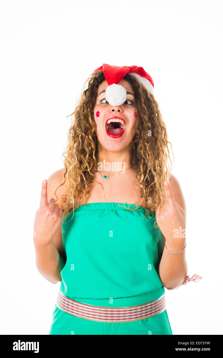 Office Party Animals: A young woman girl enjoying herself having fun  at  a Christmas Xmas theme fancy dress 'office party' christmas party, UK Stock Photo