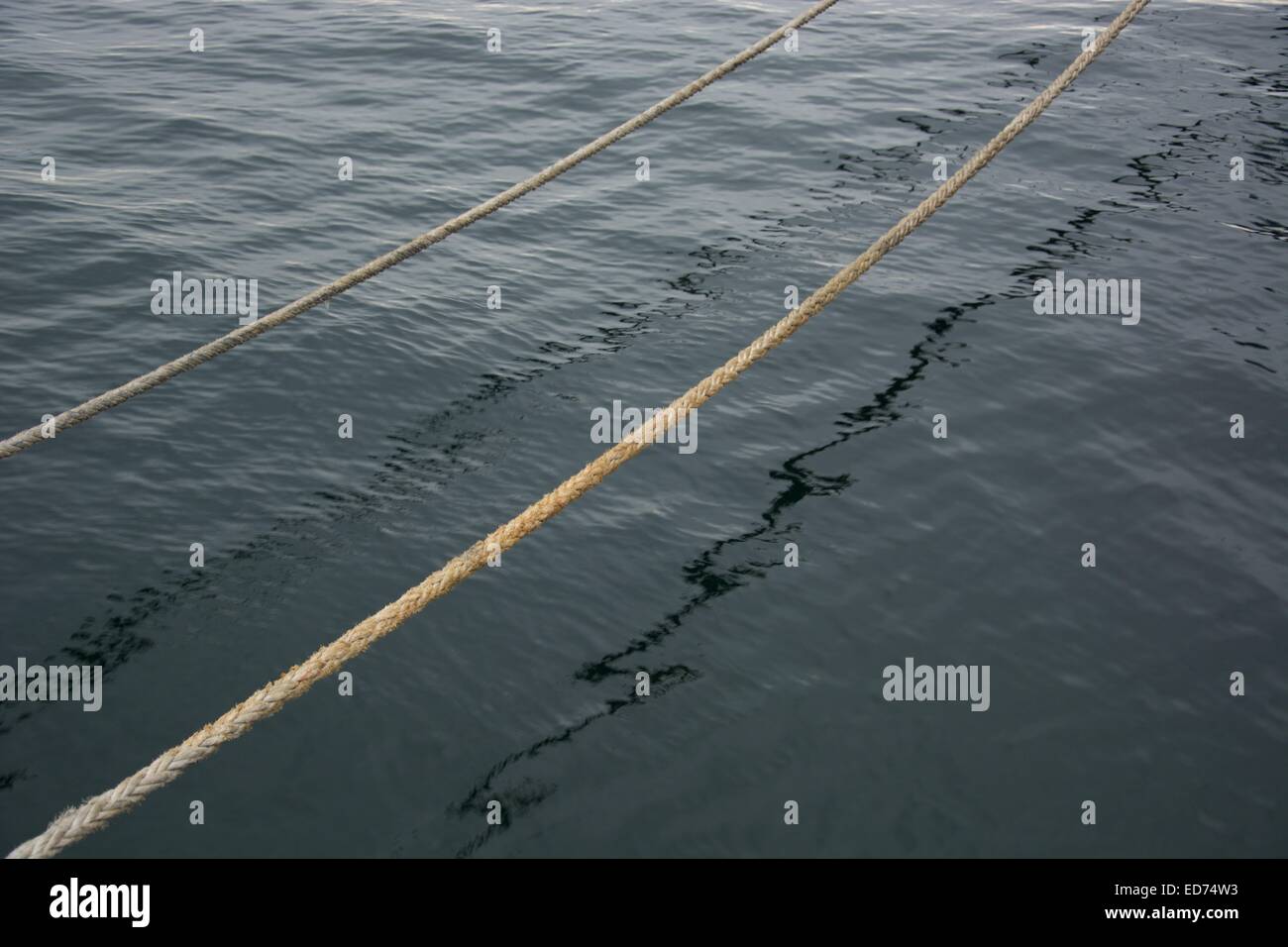 Weather Ropes Crossing ropes crossing the sea Stock Photo - Alamy