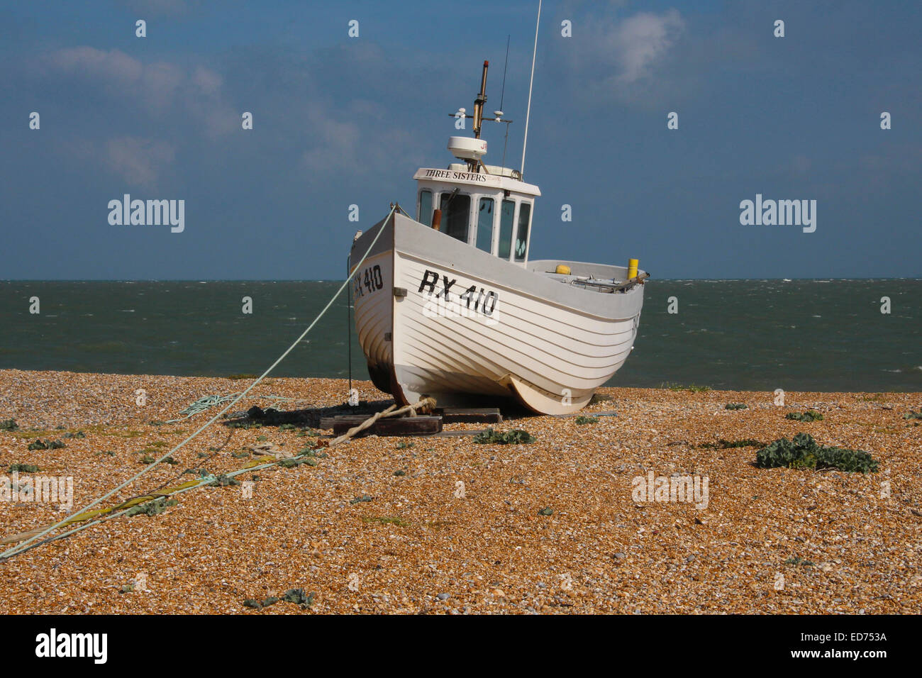 Fishing boat on the shingle at Dungeness, Britain's only desert Stock Photo