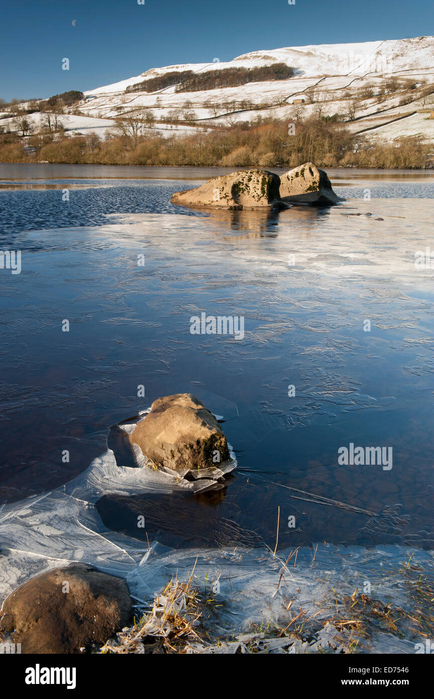 Semer Water in winter, with ice forming around the edge. Wensleydale, North Yorkshire, UK Stock Photo
