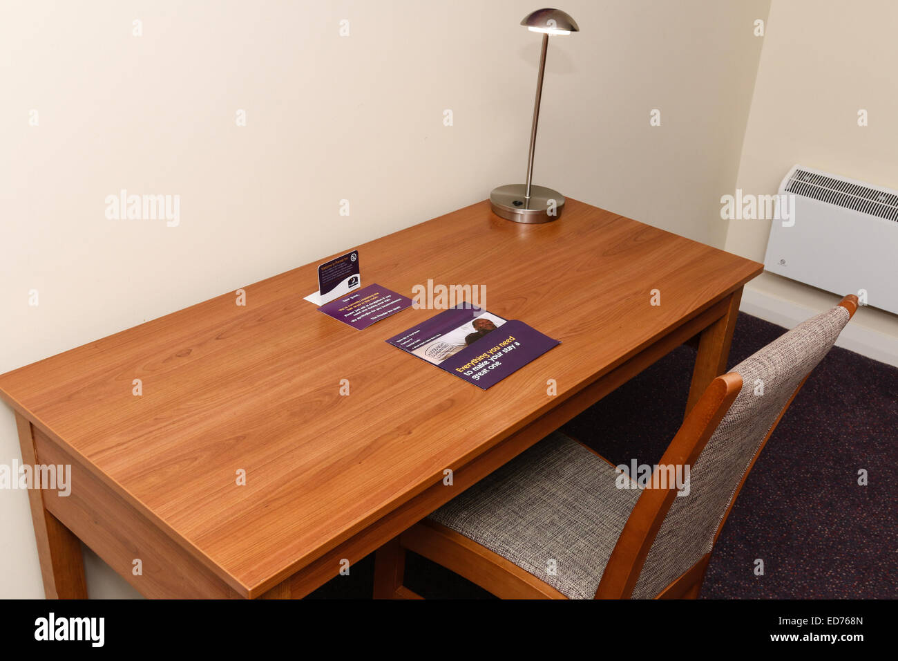 Desk in a Premier Inn hotel room.  Premier Inn is the UK's largest hotel brand, with over 50,000 rooms and more than 650 hotels. Stock Photo