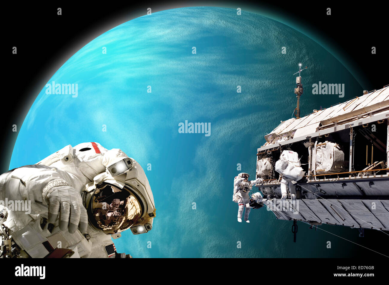 An artist's depiction of a team of astronauts performing work on a space station while orbiting a large, water covered alien pla Stock Photo
