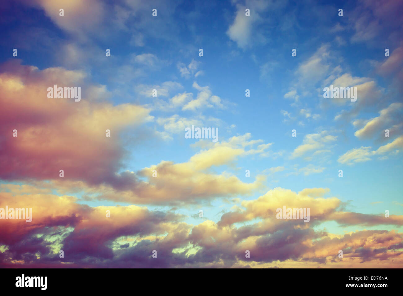 Colorful cloudy sky, toned effect photo background Stock Photo