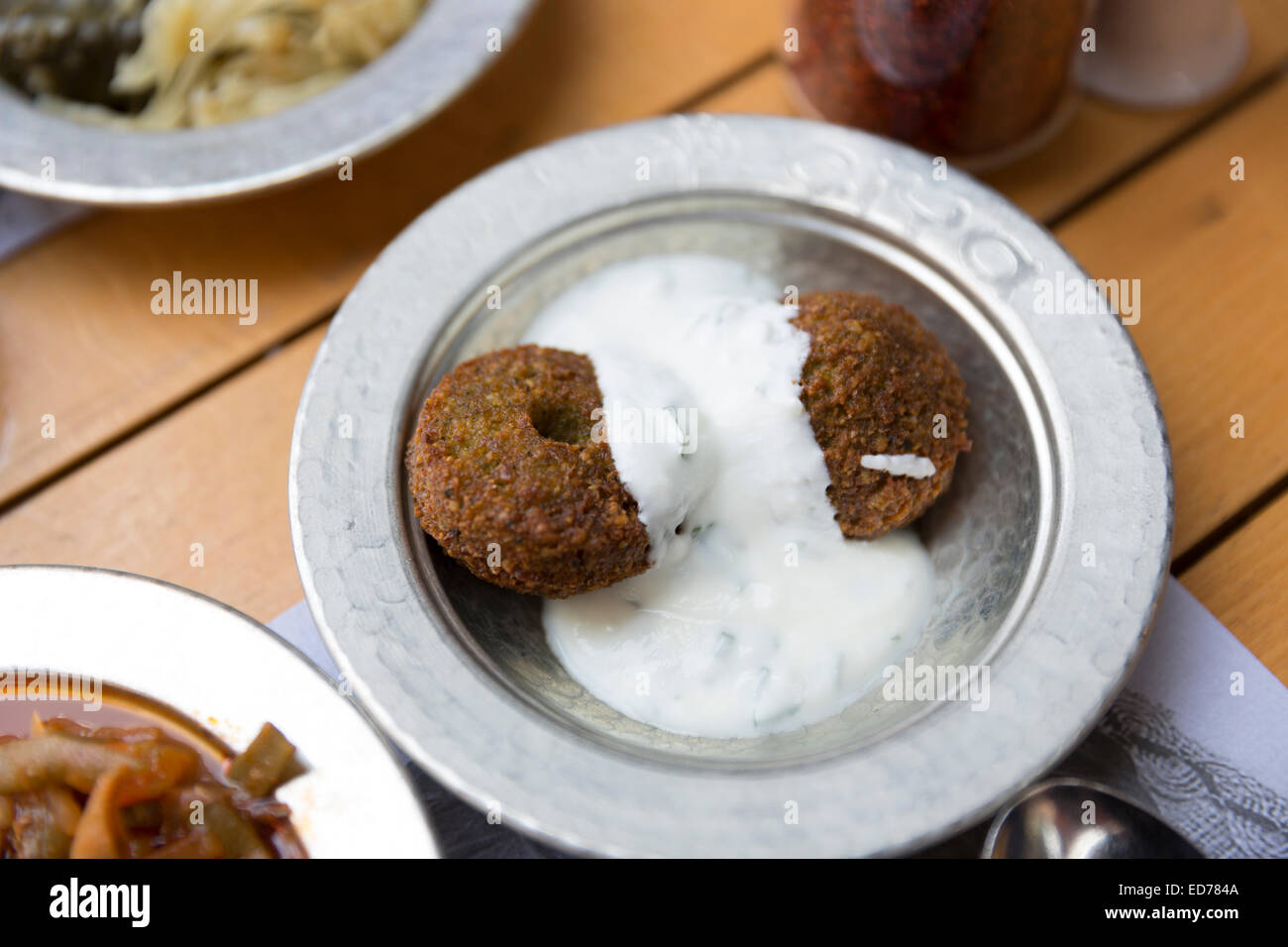 Falafel yoghurt plate at Ciya Sofrasi Turkish restaurant in Kadikoy district Asian side Istanbul, East Turkey Stock Photo