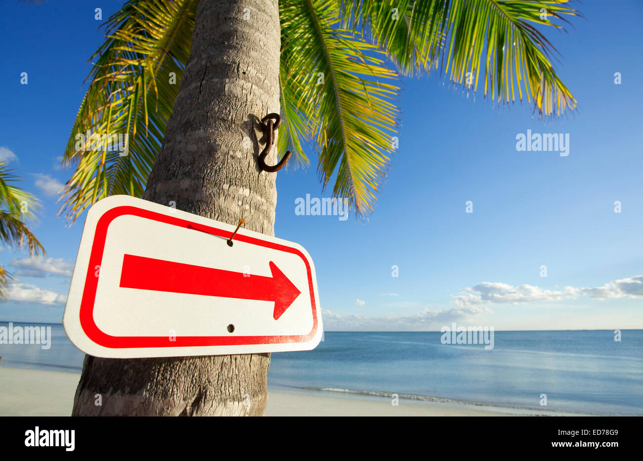 sign pointing to beach Stock Photo