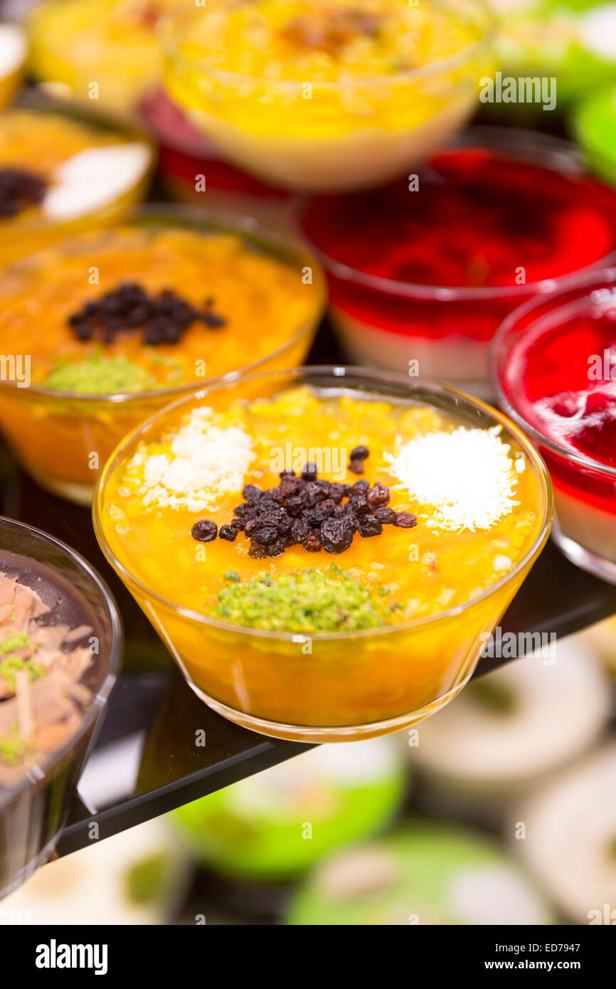 Turkish sweet desserts Zerde jelly fruits nuts at Turk Edebiyati Dergisi (Edebiyat Kiraathanesi) cafe tearooms, Istanbul, Turkey Stock Photo