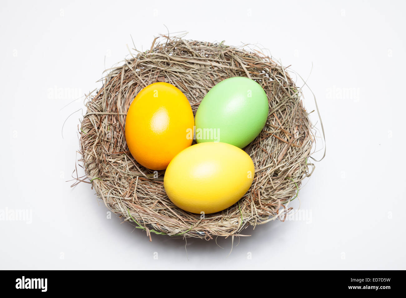 easter nest with eggs on white background Stock Photo - Alamy