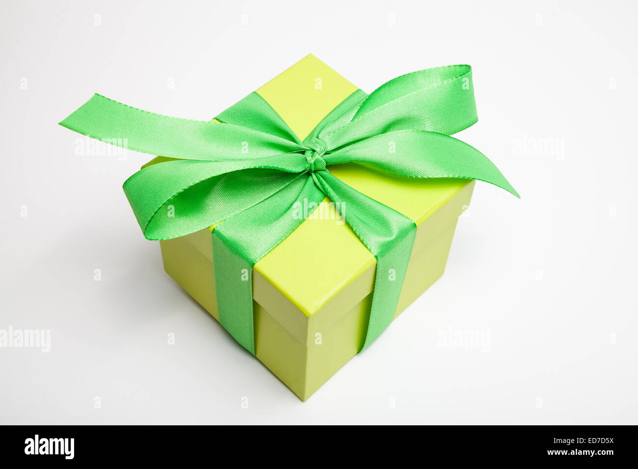 gift box in yellow and green loop Stock Photo Alamy
