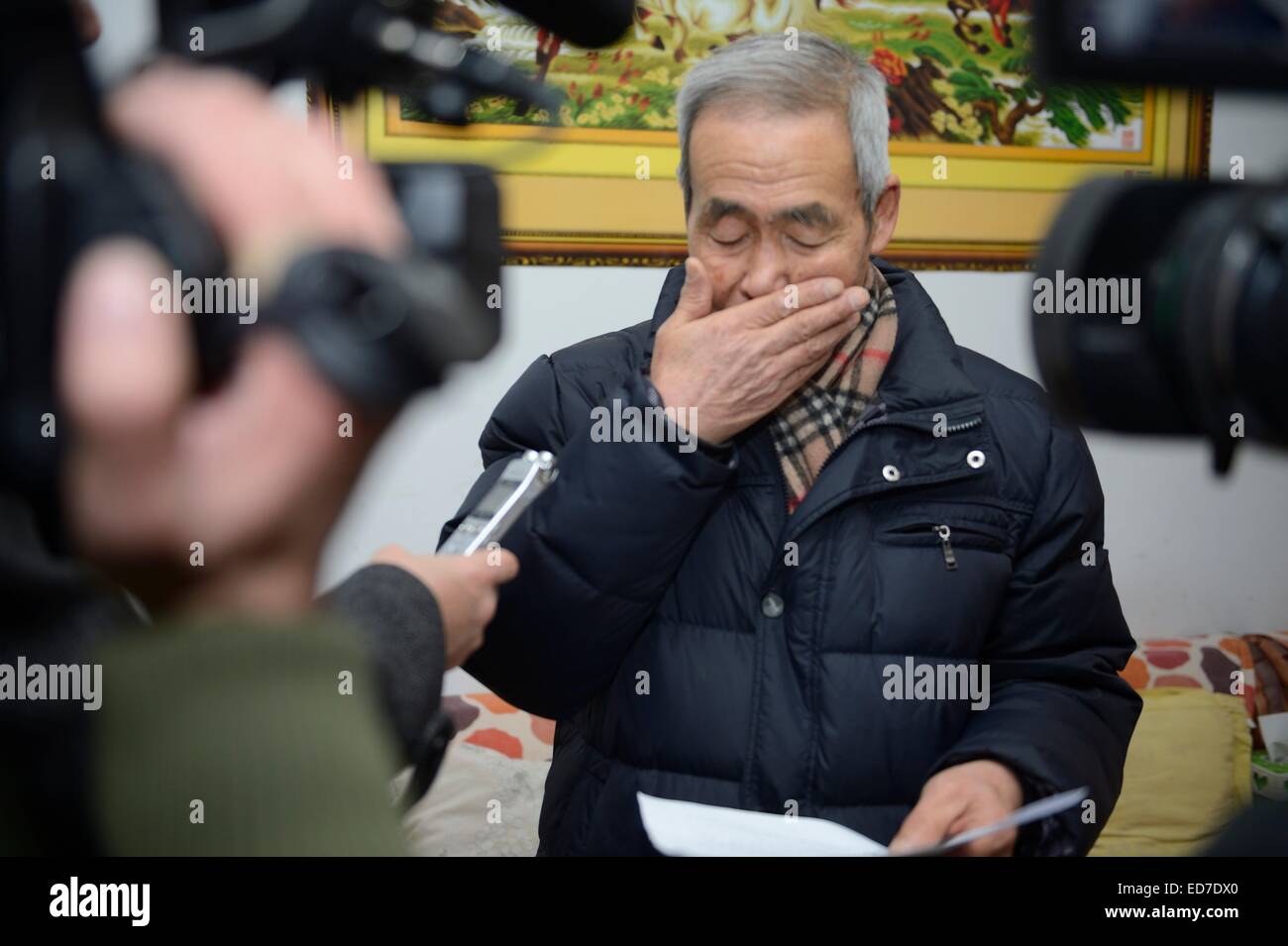 Hohhot, Inner Mongolia, China. 31st Dec, 2014. Hu Ge Ji Le Tu's parents got 2.06 million compensation from Inner Mongolia supreme people's court in Hohhot, Inner Mongolia, China on 31th December, 2014. © TopPhoto/Alamy Live News Stock Photo