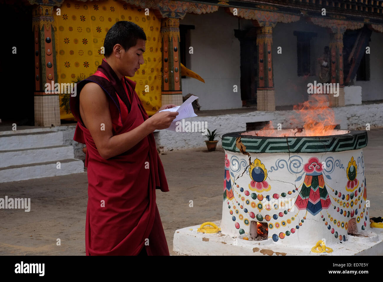 A Buddhist monk taking part in a ritual ceremony inside the 17th ...