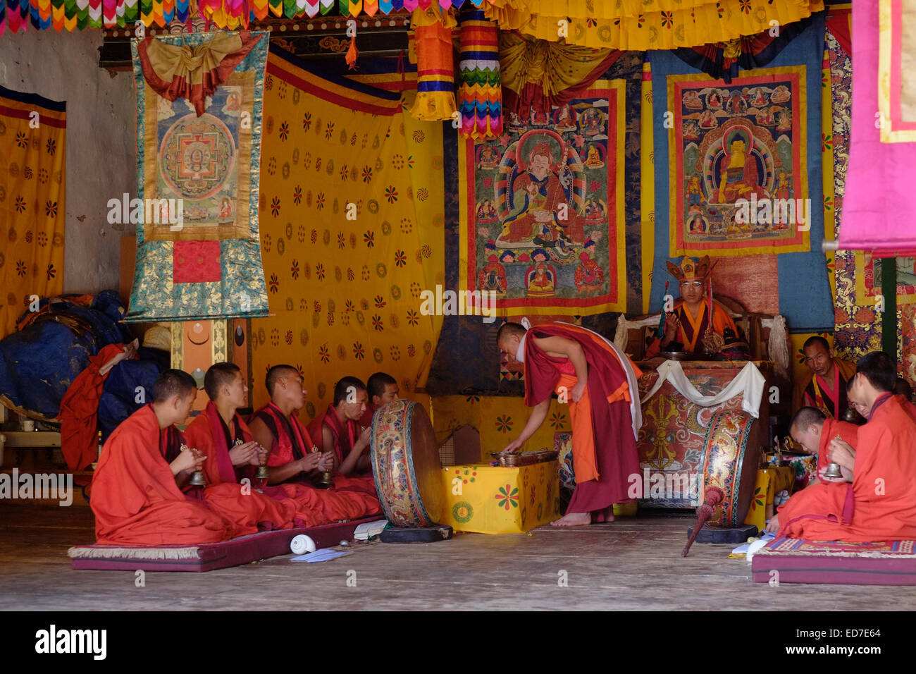 Buddhist novices taking part in a ritual ceremony inside the 17th ...