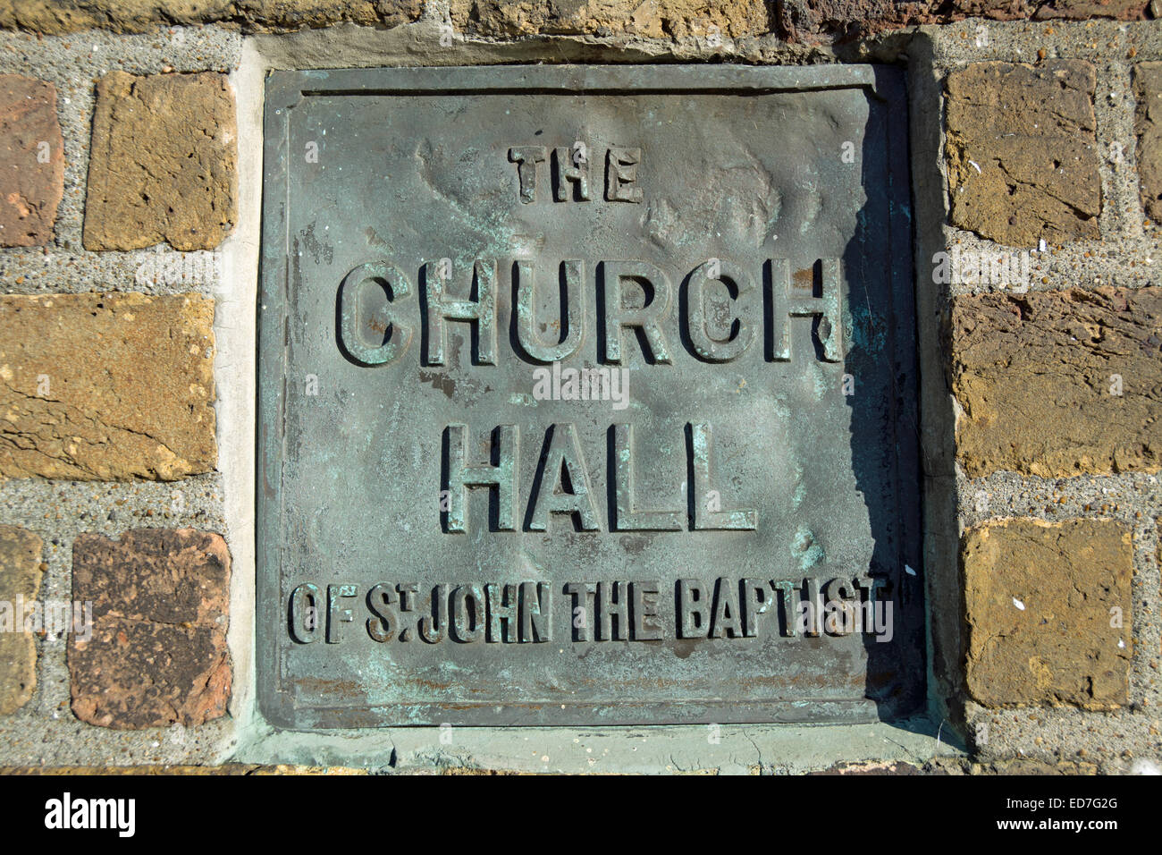 wall plaque marking the church hall of st john the baptist church, hampton wick, middlesex, england Stock Photo