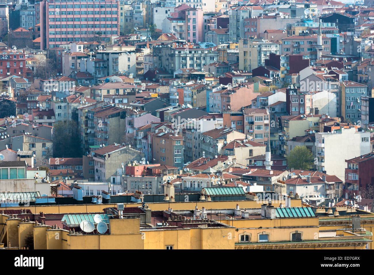Skyline cityscape apartment blocks and offices of Karakoy and Beyoglu satellite dishes infrastructure in Istanbul, Turkey Stock Photo