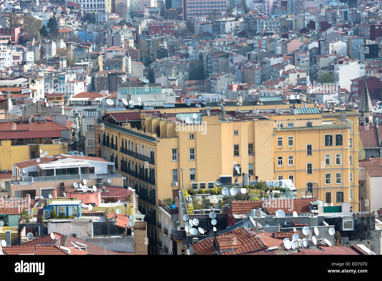 Skyline cityscape apartment blocks and offices of Karakoy and Beyoglu and satellite dishes infrastructure in Istanbul, Turkey Stock Photo