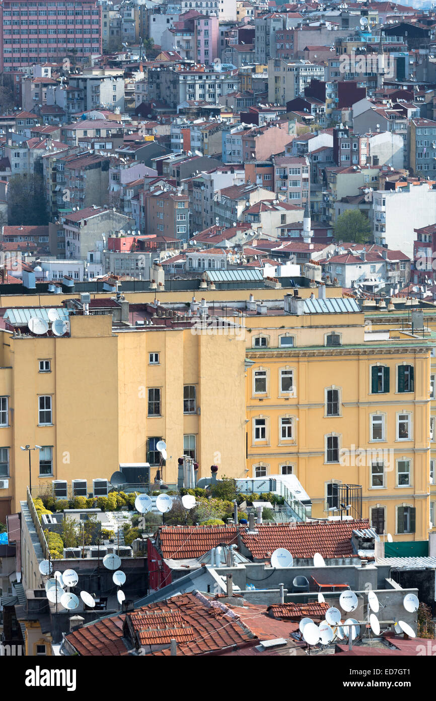 Skyline cityscape apartment blocks and offices of Karakoy and Beyoglu and satellite dishes infrastructure in Istanbul, Turkey Stock Photo