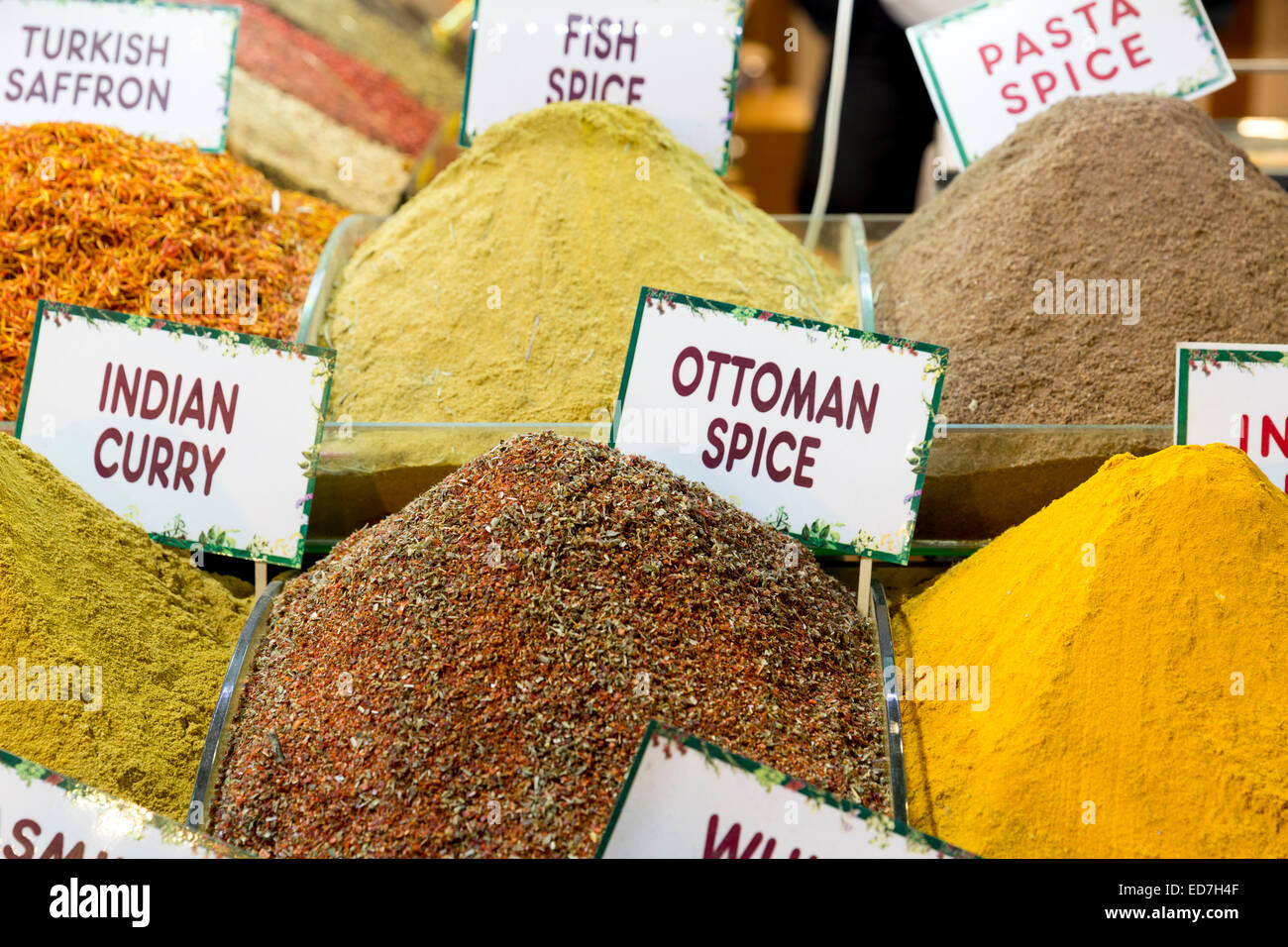 Traditional spices - saffron, curry, Ottoman, in Misir Carsisi Egyptian Bazaar food and spice market, Istanbul, Turkey Stock Photo
