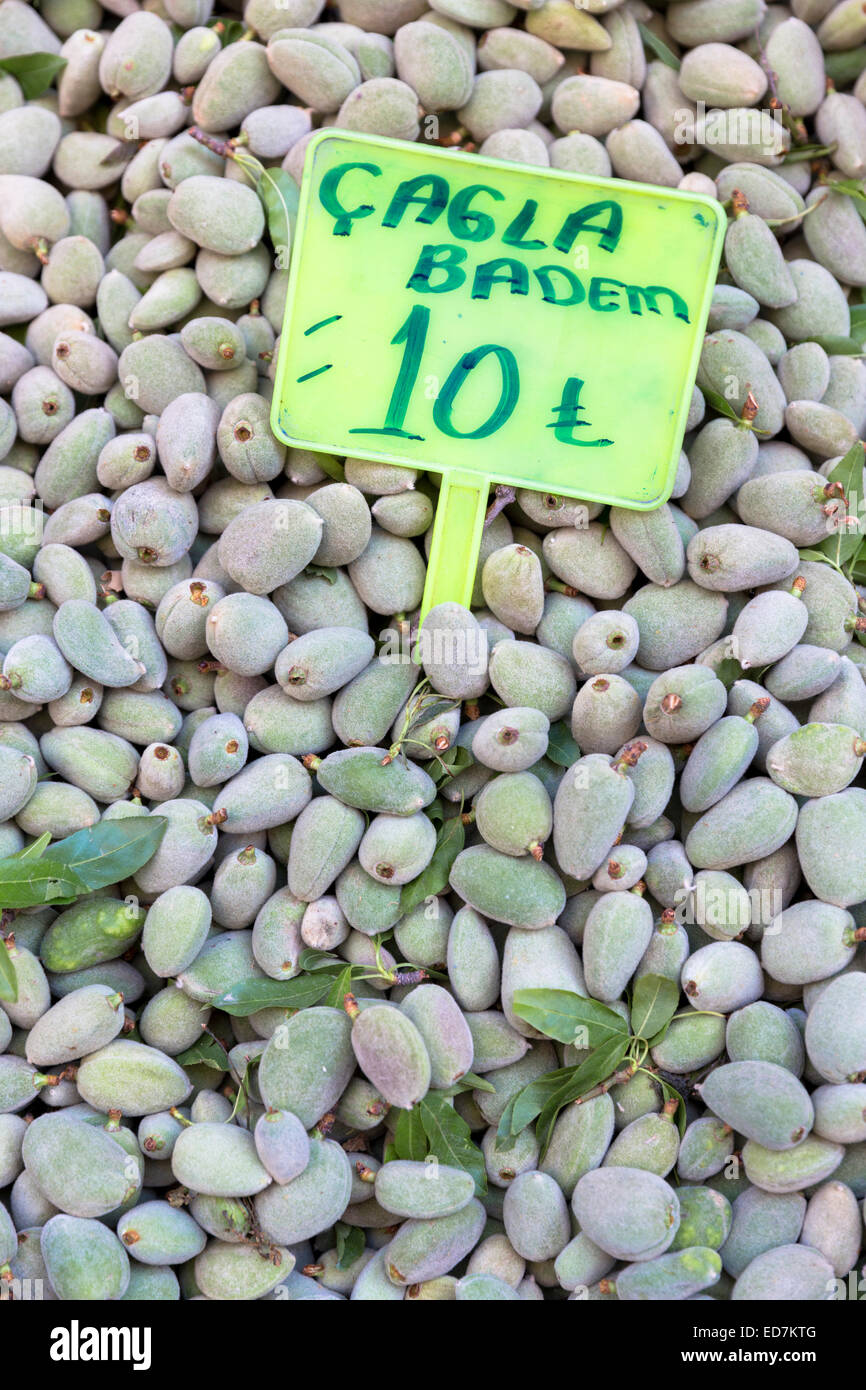Fresh almonds Cagla Badem, with Turkish lira price ticket on sale in food market in Kadikoy district Asian side Istanbul, Turk Stock Photo