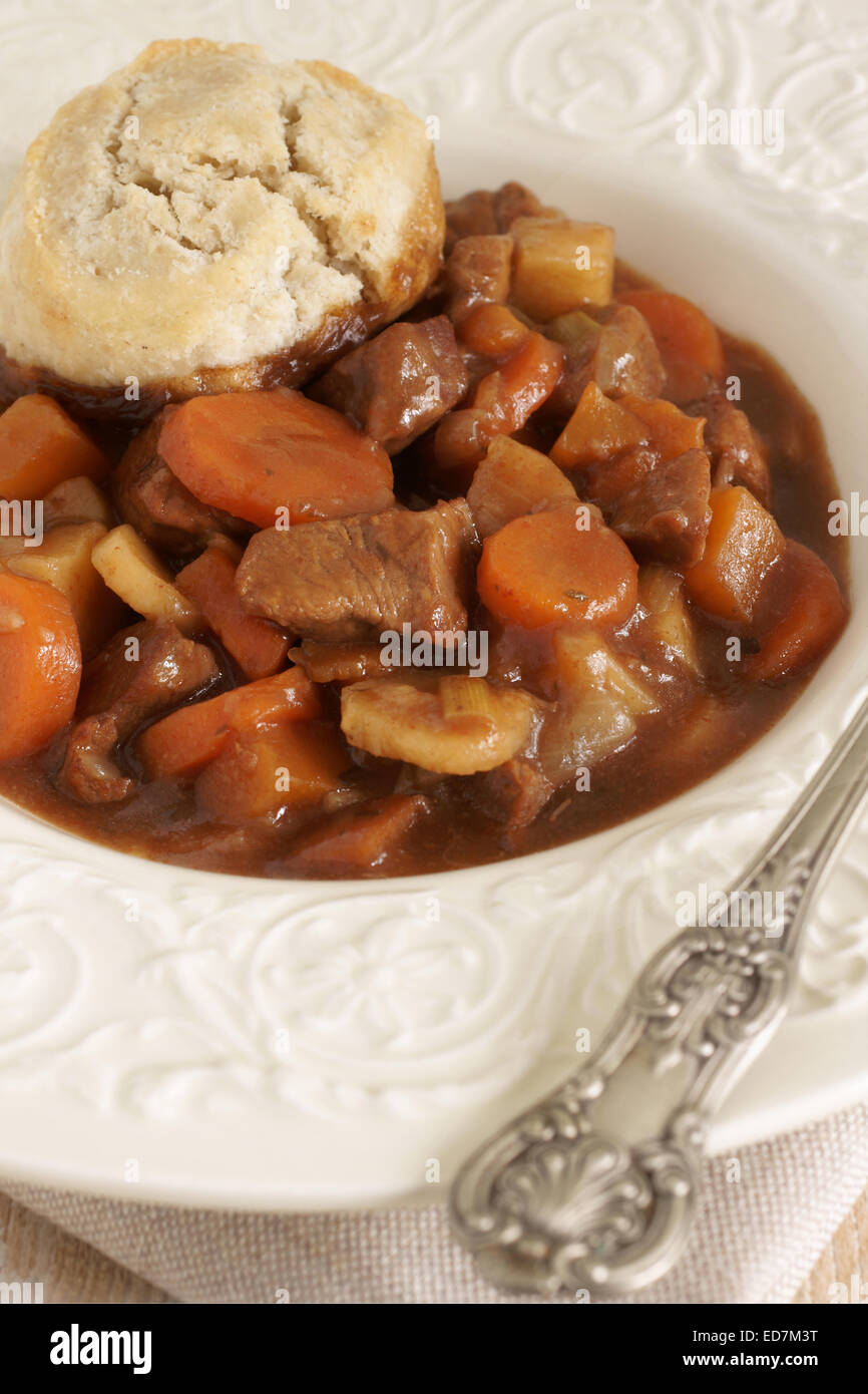 Classic beef cobbler or beef stew with suet dumplings Stock Photo