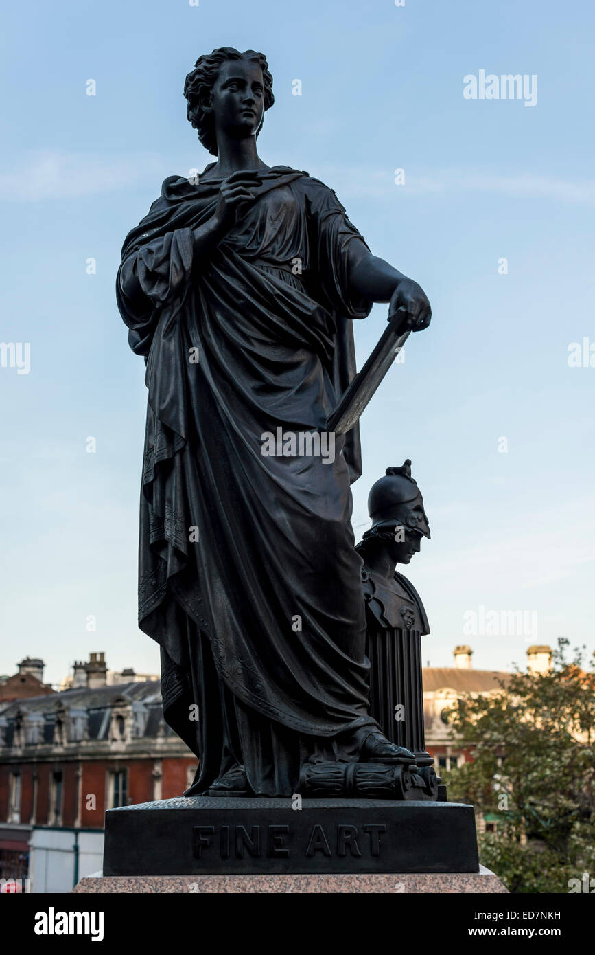 A statue of a lady representing Fine Art on Holborn Viaduct, a Victorian road bridge in the City of London Stock Photo