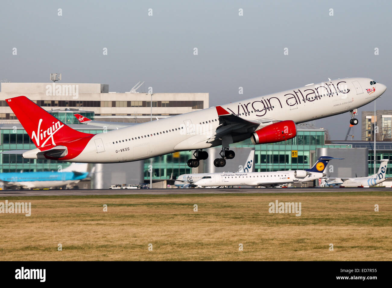 Virgin Atlantic Airbus A330-300 departs from runway 05L at Manchester airport. Stock Photo