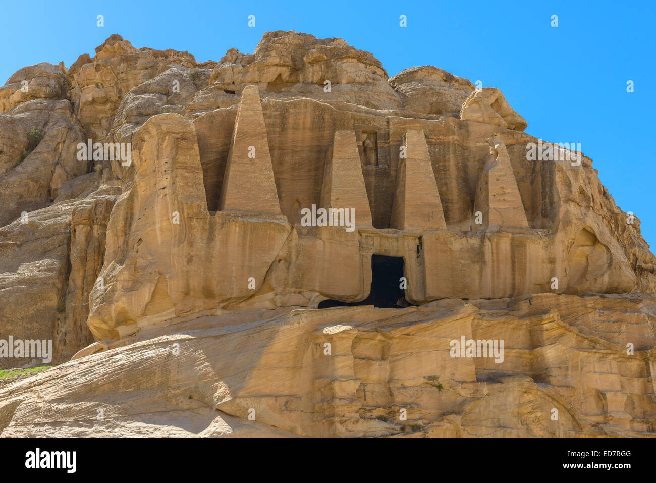 Rock cut tombs in the ancient nabatean city of Petra in Jordan Stock ...