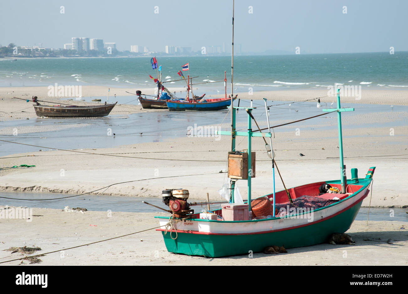Fishing boats on the beach at Hua Hin Thailand Asia Stock Photo