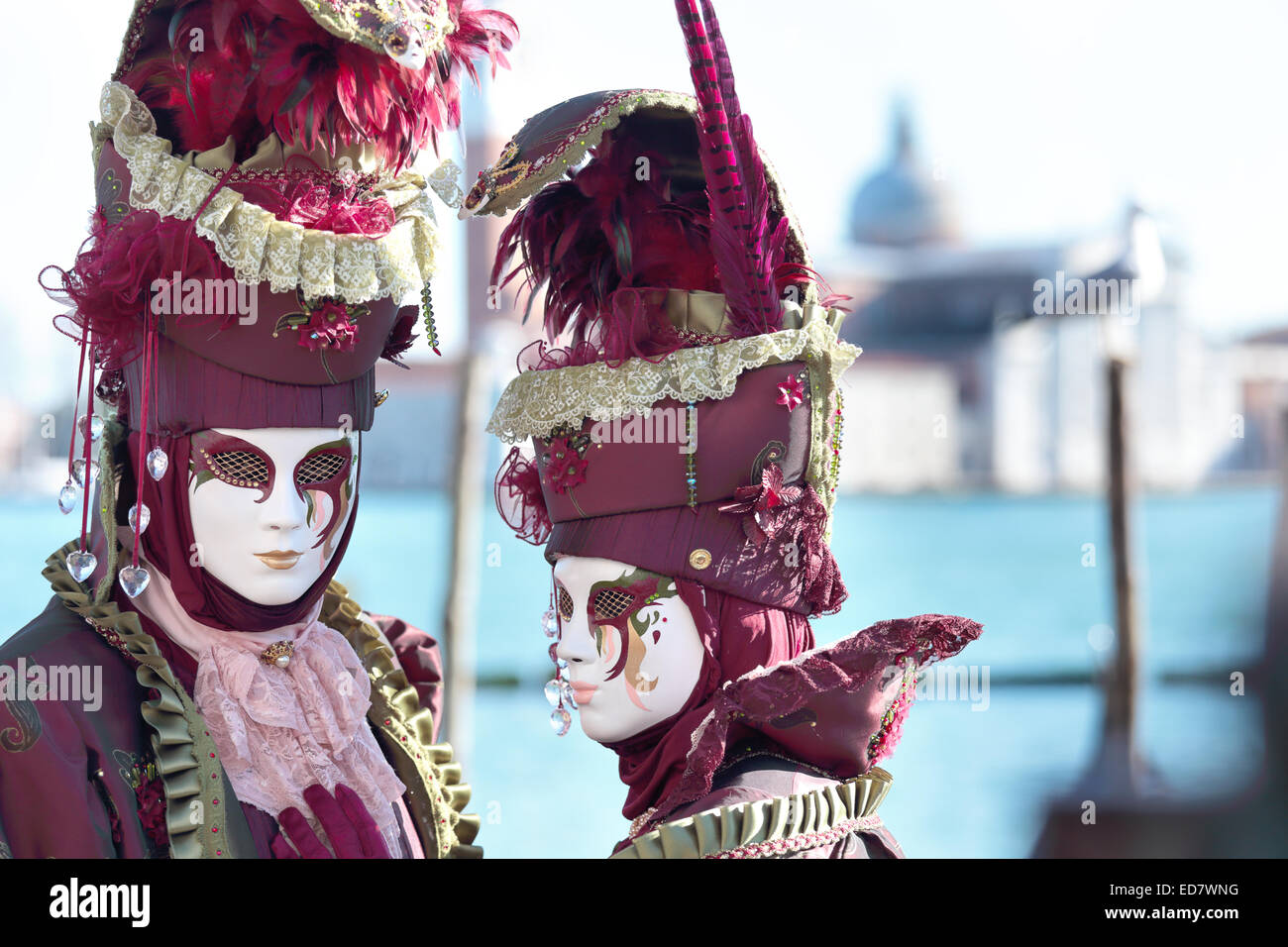 A masked couple exhibited during the traditional festival of Carnival of Venice, Italy (2014 edition) Stock Photo