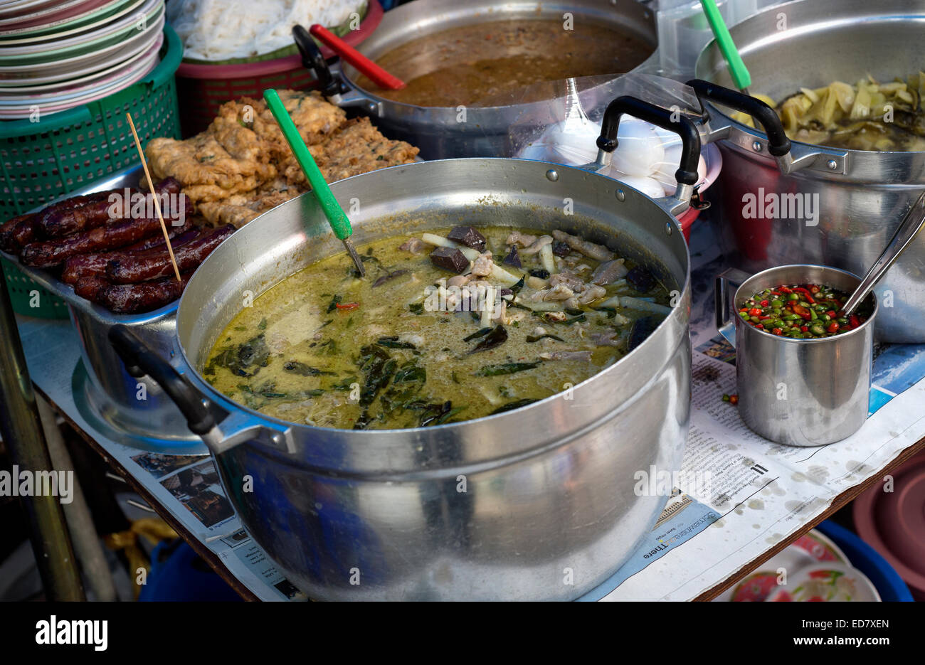 Thai green curry for sale at an outdoor street restaurant in Bangkok, Thailand Stock Photo
