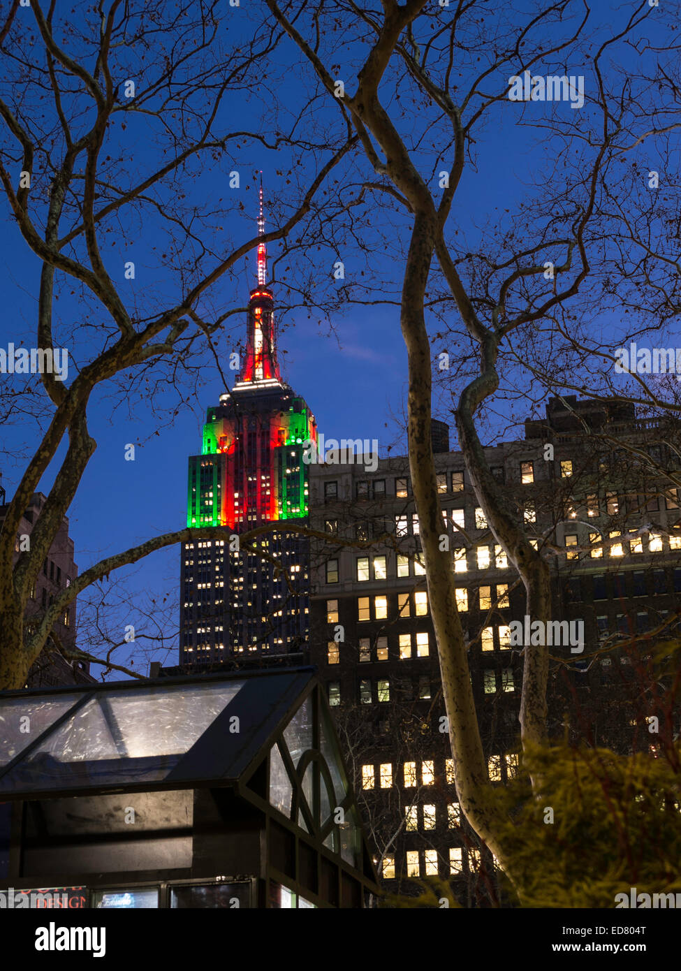 The Empire State Building Looms over the Bank of America Winter Village, Bryant Park, NYC Stock Photo