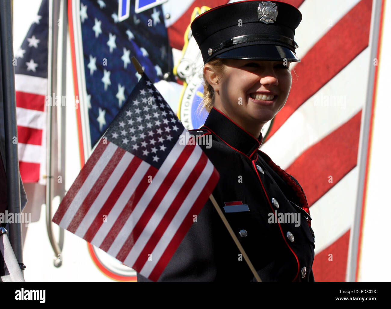 A woman Milwaukee Fire Department firefighter in dress uniform in the